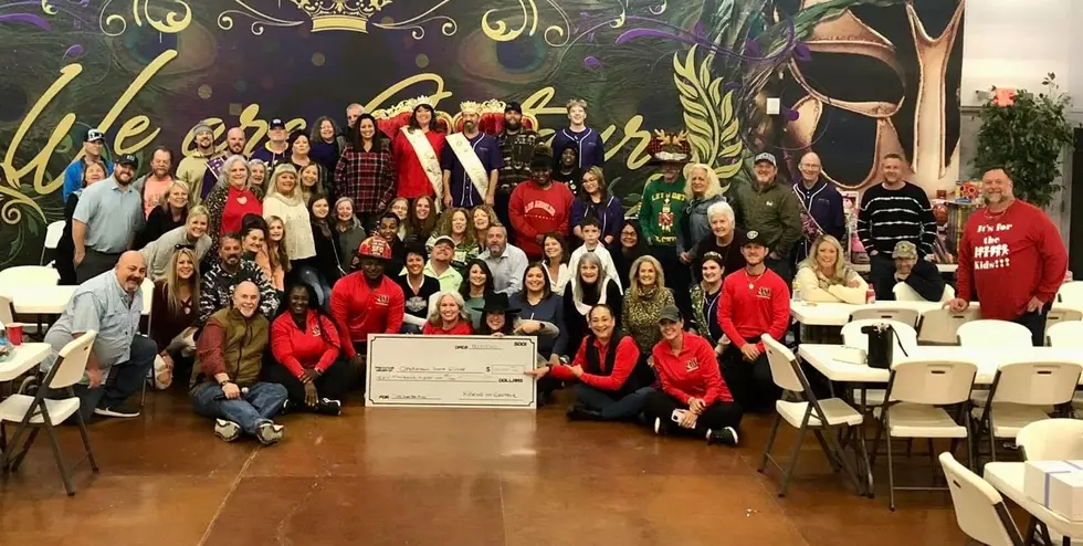 Krewe of Centaur Makes HUGE Donation to Operation Santa Claus